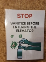 Sign Posted to Sanitize Before Entering Elevator thumbnail