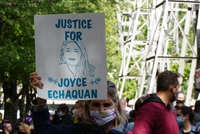 Protestors holding sign demanding justice for Joyce Echaquan  thumbnail