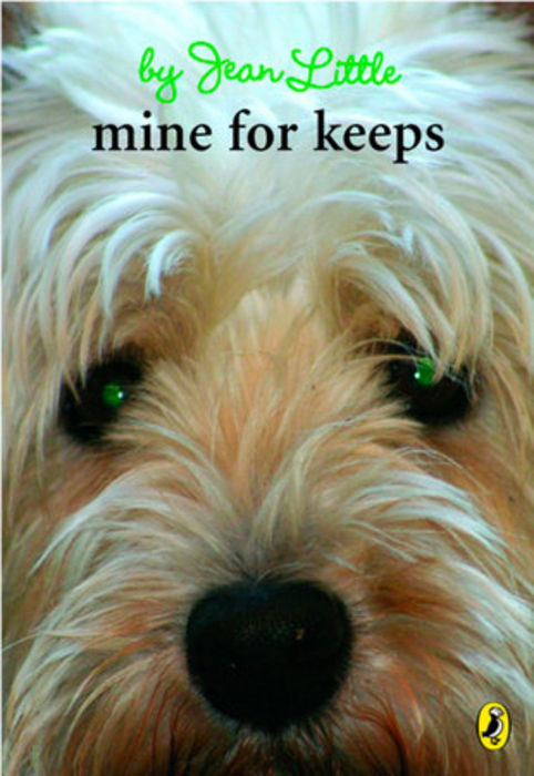 A close-up picture of a cream-coloured, shaggy dog with a black nose and green eyes. Superimposed over this image and centered at the top of the page  is text that reads "by Jean Little" in green cursive script. Dircectly under this is "mine for keeps" in black text. The bottom right-hand corner features the Penguin Random House logo of a little black penguin.