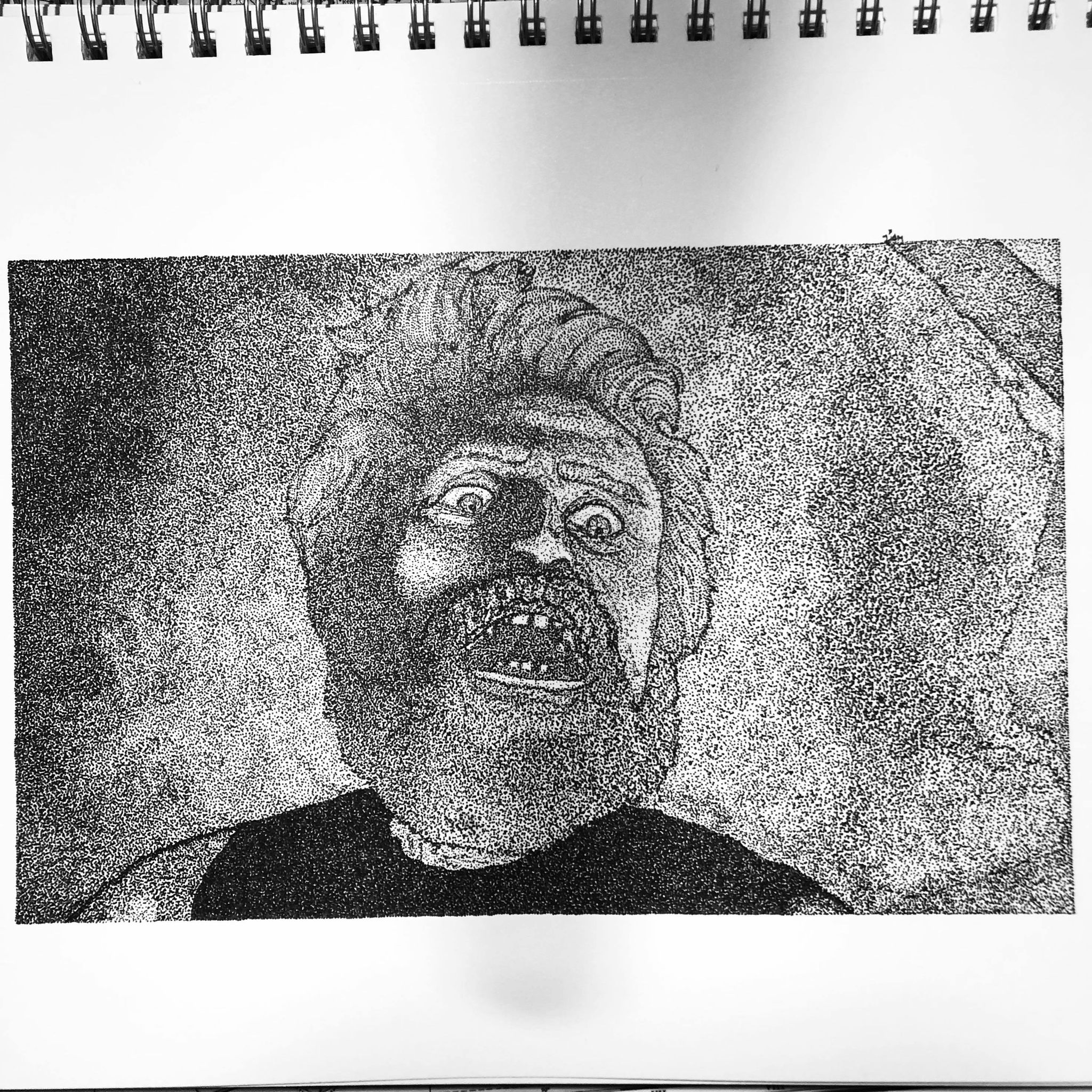 A pointillism sketch of Willem Dafoe's character in the 2019 film "The Lighthouse." The sketch is black-and-white and is a close-up on Dafoe's character's face in a state of shock, panic, and disbelief. The sketch was completed in COVID self-isolation after being inspired by the film, which centres around being socially isolated and experiencing the effects of cabin-fever.