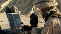 Soldier using laptop image thumbnail